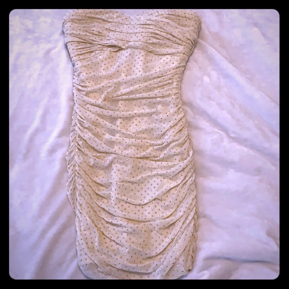 Xs Strapless Bebe gold sequin dress.